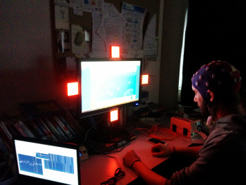 A participant playing the BrainDriver Brain-Computer Interface game.